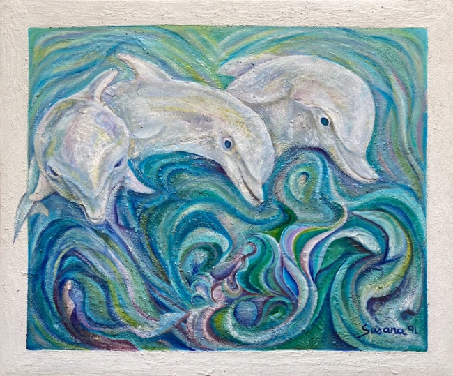 Delfines jugando