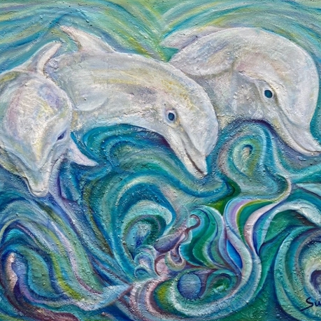 Delfines jugando
