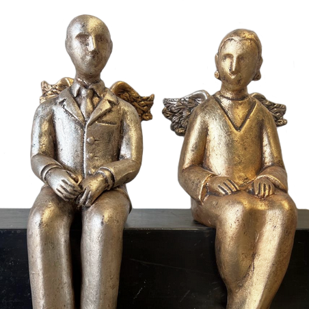 Pareja clásica con alas